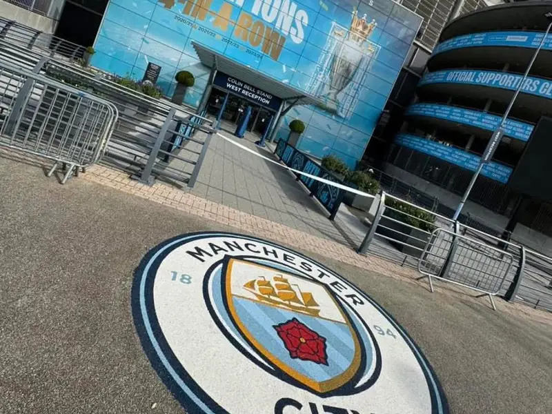 Manchester City crest laid in resin bound stone outside the Etihad Stadium by T&A Resin