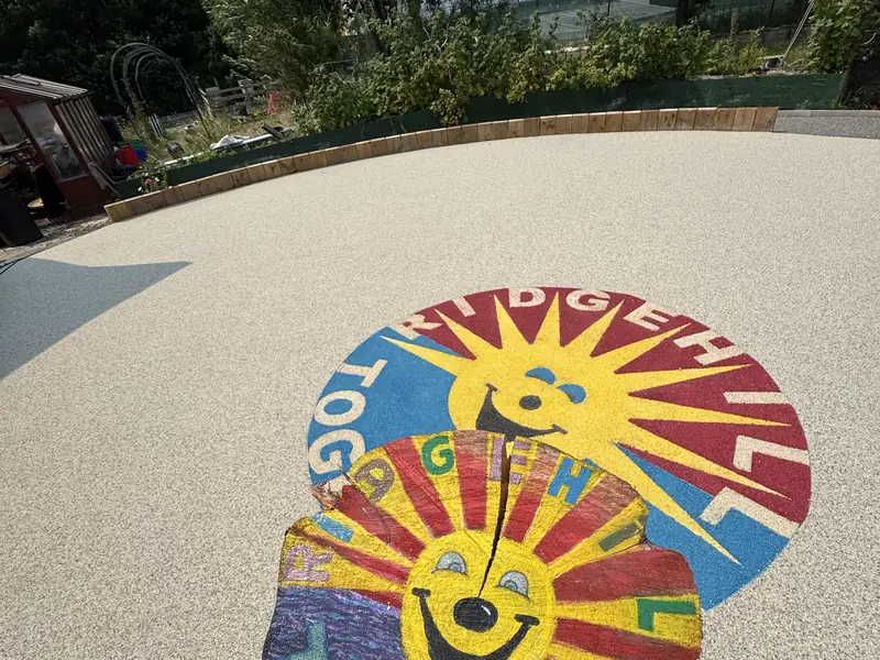Ridgehill logo recreated in coloured resin, shown beside the original hand painted sign
